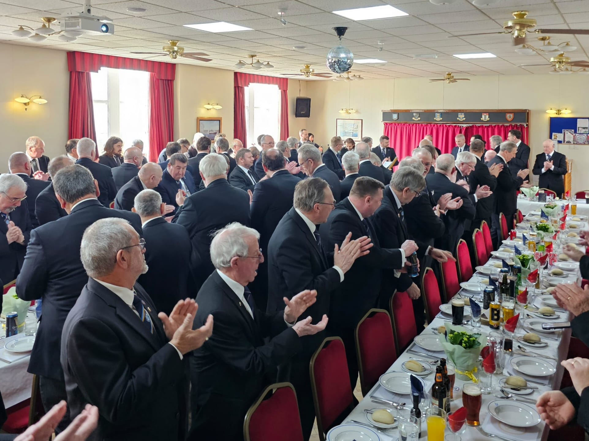 Freemasons enjoying a traditional Festive Board dinner at Beverley Road Masonic Hall in Hull, celebrating friendship and Masonic fellowship.