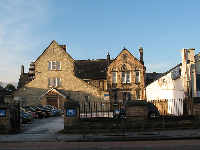 Exterior view of Beverley Road Masonic Hall in Hull, showing the historic stone building and adjacent car parking area.